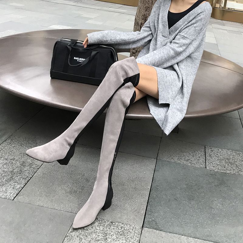 时尚的尖头设计,过膝长筒的高跟靴,散发性感女神气质